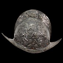 Italian morion from the second half of the 16th century with embossed decoration.