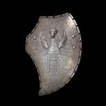 Important italian ceremonial shield with embossed decoration.