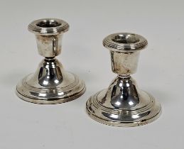 Pair of modern silver squat candlesticks, each of circular form, hallmarked Birmingham 1981 by