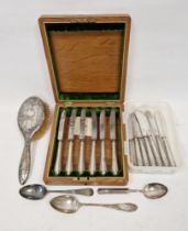 Cased set of six silver handled butter knives, the blades marked Cooper Brothers, Sheffield,