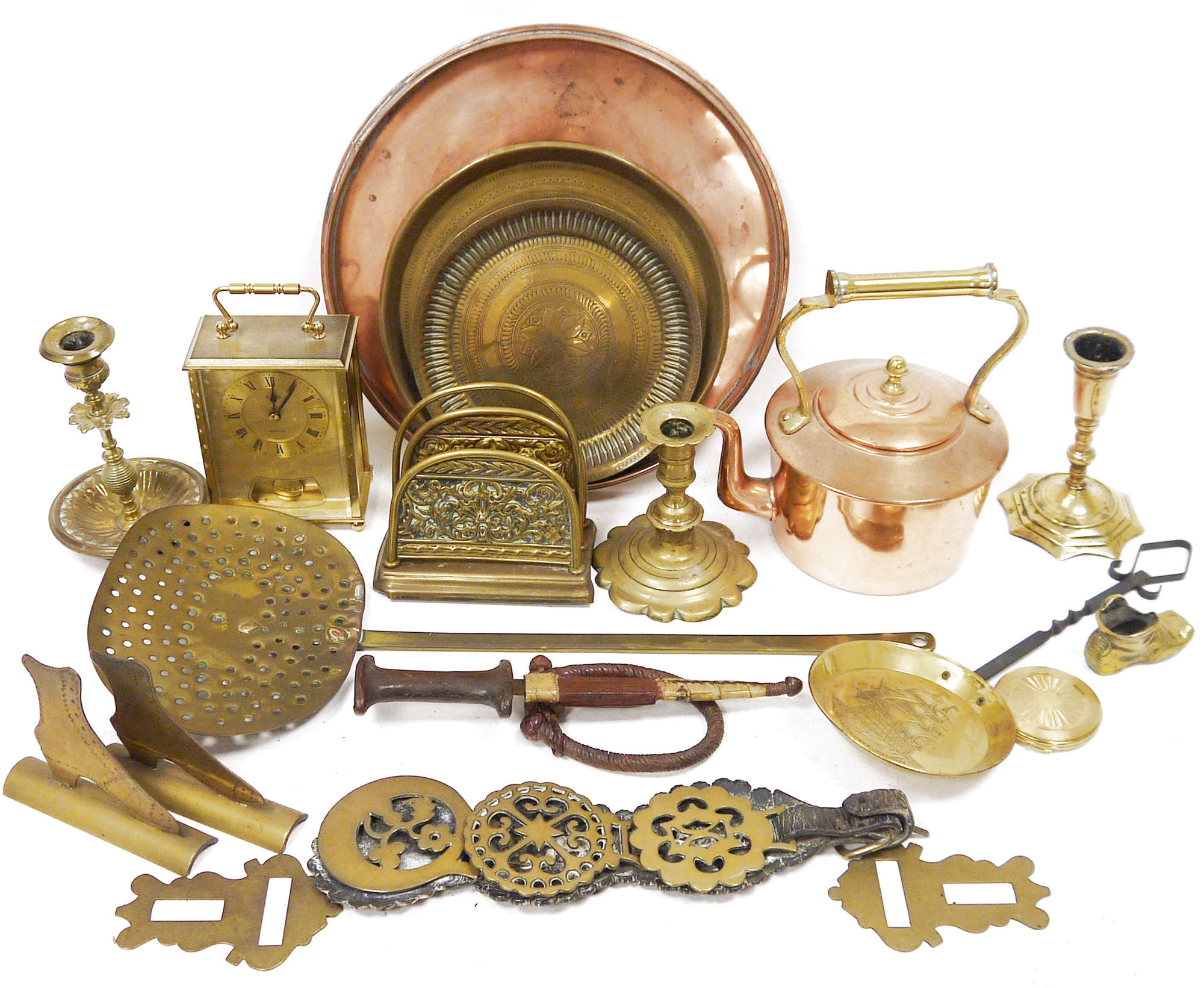 Assorted brass and copper including a Victorian kettle, a brass toast rack, a circular copper