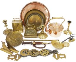 Assorted brass and copper including a Victorian kettle, a brass toast rack, a circular copper