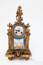 Late 19th century French Sevres-style gilt metal and porcelain mounted mantel clock surmounted