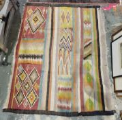 Kilim rug having bands of geometric lozenge and chevon decoration, 162cm x 126cm