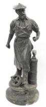 French bronzed spelter figure of 'Industrie' cast as an aproned man beside an anvil, with cogs or