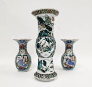 A Chinese famille verte gu-shaped vase and a pair of Japanese porcelain vases, the first probably