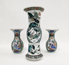 A Chinese famille verte gu-shaped vase and a pair of Japanese porcelain vases, the first probably