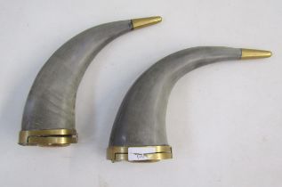 19th century pair of horn flasks, with brass mounts and each set with a single cabochon variegated