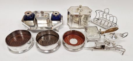 Collection of silver-plate including a set of three mahogany and silver-plated wine bottle coasters,