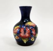 Small Moorcroft iris pattern flower vase, 20th century, applied with Moorcroft Potter to the Late