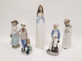 Lladro porcelain figure of a sailor boy, seated on a column holding a model ship and four Nao