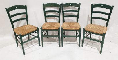 Set of four green painted wicker-seated dining chairs, each with turned legs, 89cm high