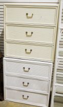 Two similar painted cane-style chests of drawers, each having three long drawers, one white in