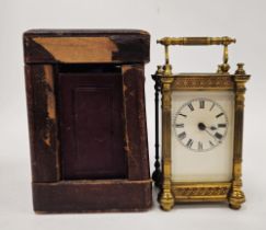 Early 20th century French five-glass carriage clock, the brass case ornately decorated in gothic