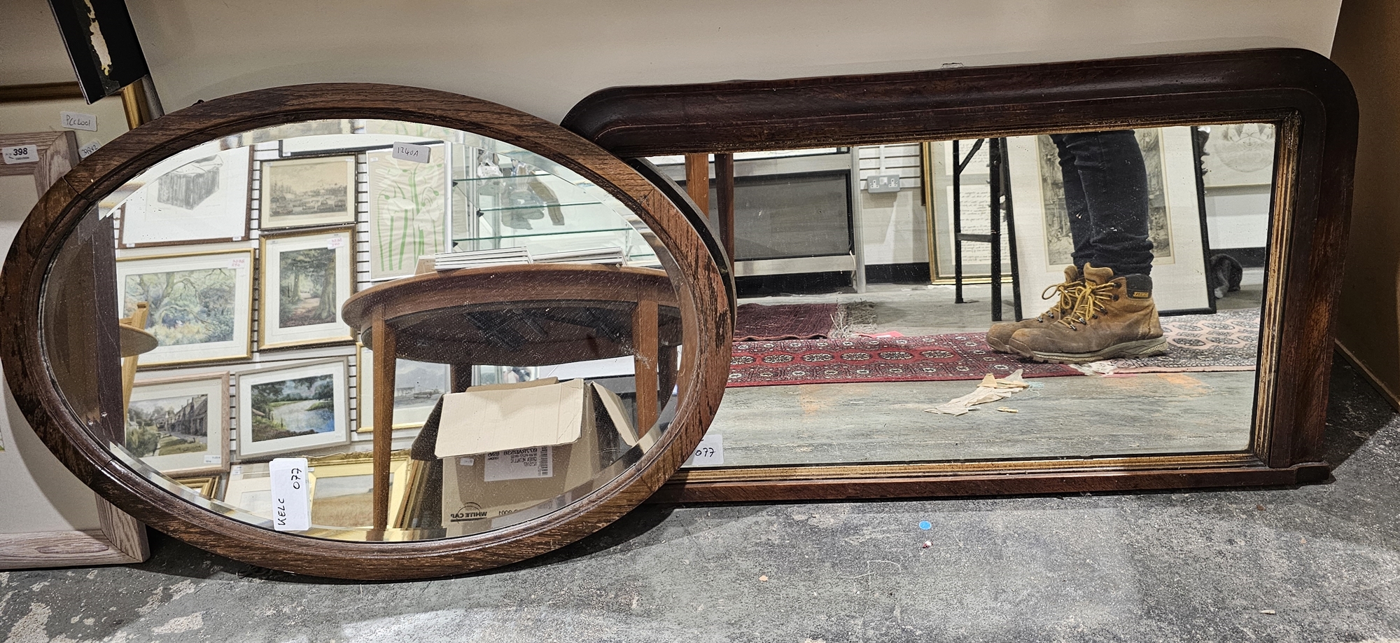 Early/mid 20th century oak framed bevelled edged wall mirror, of oval