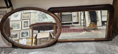 Early/mid 20th century oak framed bevelled edged wall mirror, of oval form, 75cm by 52cm, together