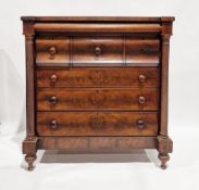 Victorian mahogany chest of drawers having a concealed frieze drawer, over three short and  three