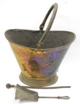 Victorian brass helmet shaped fire bucket with swing handle and assorted fire tools