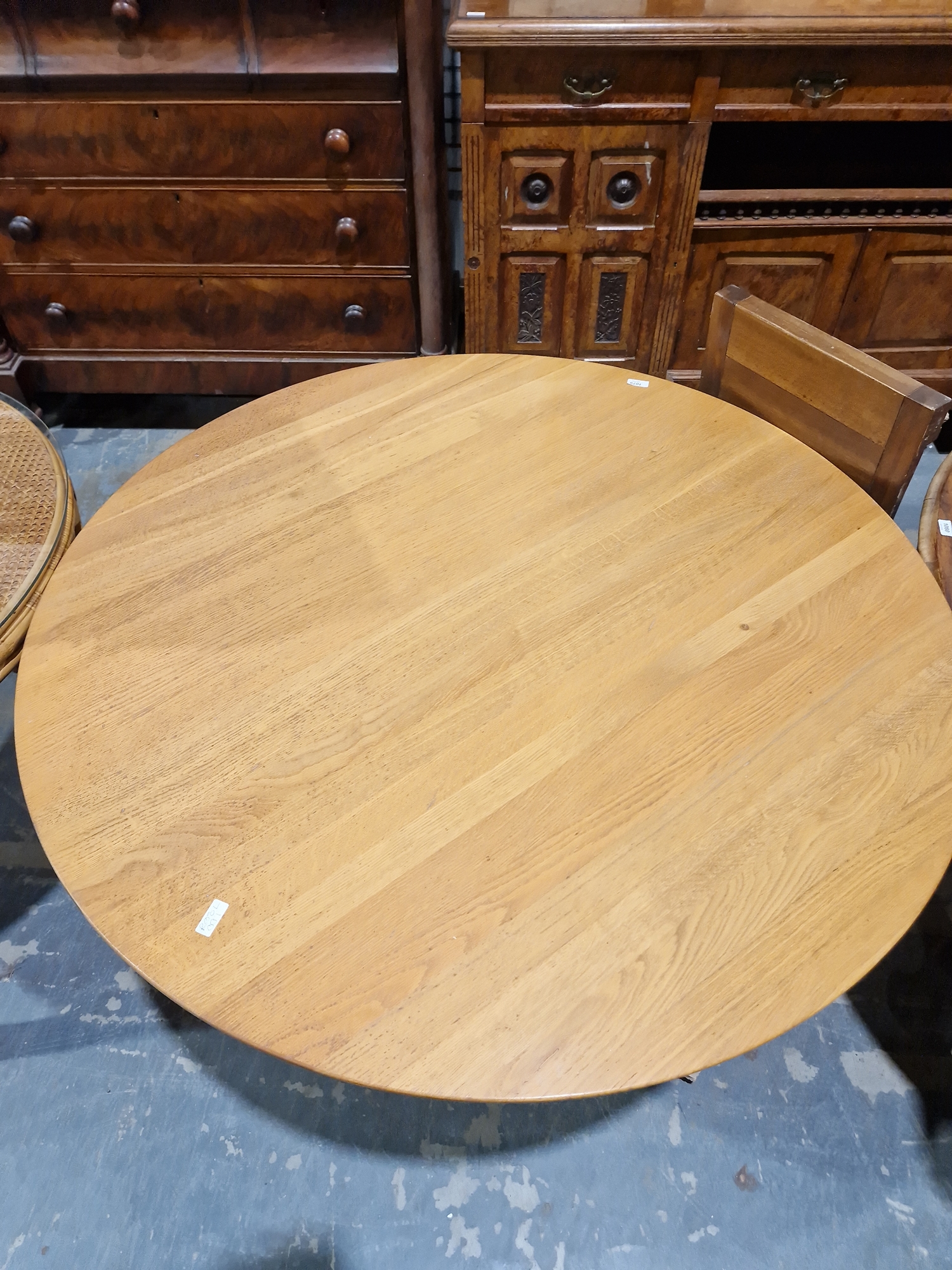 Light oak dining table of circular form, with turned column and circular foot, 73cm high x 121cm - Image 2 of 15