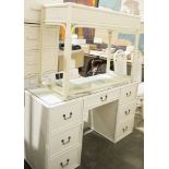 20th century white painted cane-style kneehole desk having a single central long drawer flanked by