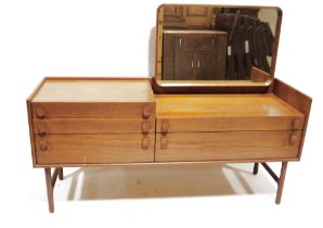 Meredew mid-century teak dressing table with mirror, raised on turned stretchered supports, 116cm