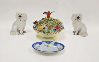 Pair of Staffordshire pottery models of dogs, late 19th century, each applied with extruded play