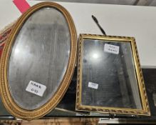 An oval bevel edged mirror within a gilt decorated frame with beaded border 55cm x 31 cm, and a