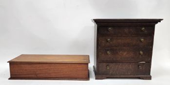 19th century oak table-top cabinet, the moulded top above four long graduating drawers, with brass