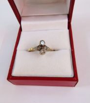 Early 20th century 18ct gold and diamond ring, having two collet set diamonds and two further