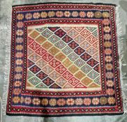 Serabend kilim, woven with triangular and lozenge-shaped medallions within geometric borders in