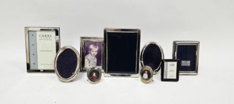 Assortment of silver-mounted photograph frames including two by Carrs both in original boxes, two of
