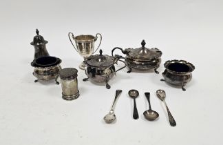 Assortment of silver condiment wares including two lidded mustard pots, a salt and pepper, two