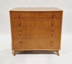 Veneered chest of drawers by Vesper Furniture, comprising four long drawers, raised on splayed legs,
