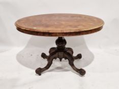 Late 19th century walnut loo table of oval form, raised on four cabriole legs connected to a central