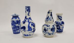 Collection of Chinese porcelain blue and white small vases, variously painted in the Kangxi-style,