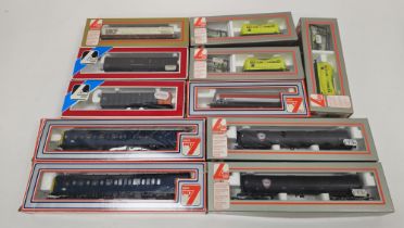 Eleven boxed Lima Models 00 gauge rolling stock to include No.305664 PTA 100t ore tipper, No.302908W