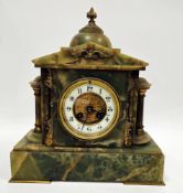 Late 19th century French onyx and gilt metal mounted mantel clock, of arched rectangular form, the