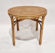 Modern bamboo-effect and cane-top conservatory dining table of circular form, with glass top, 77cm