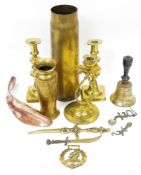 Pair of Victorian brass baluster candlesticks, a wooden handled bell, a brass shell case, assorted