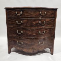 Georgian mahogany serpentine fronted chest of four long drawers of graduated form, with shaped and