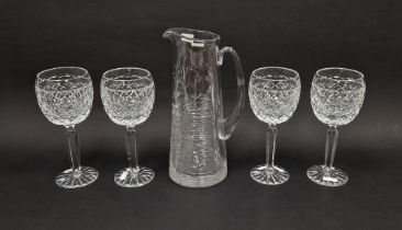 Four cut glass red wine glasses by Fred Curtis, each cut with a band of ovolos above hobnail