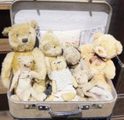 Assorted vintage and other teddy bears contained within a suitcase  Condition Report We don't do