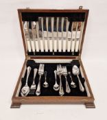 Oneida flatware table service for six persons with thread pattern handles, in walnut table-top