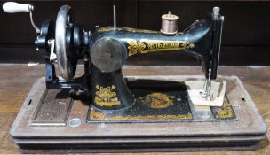 Vintage sewing machine in fitted box