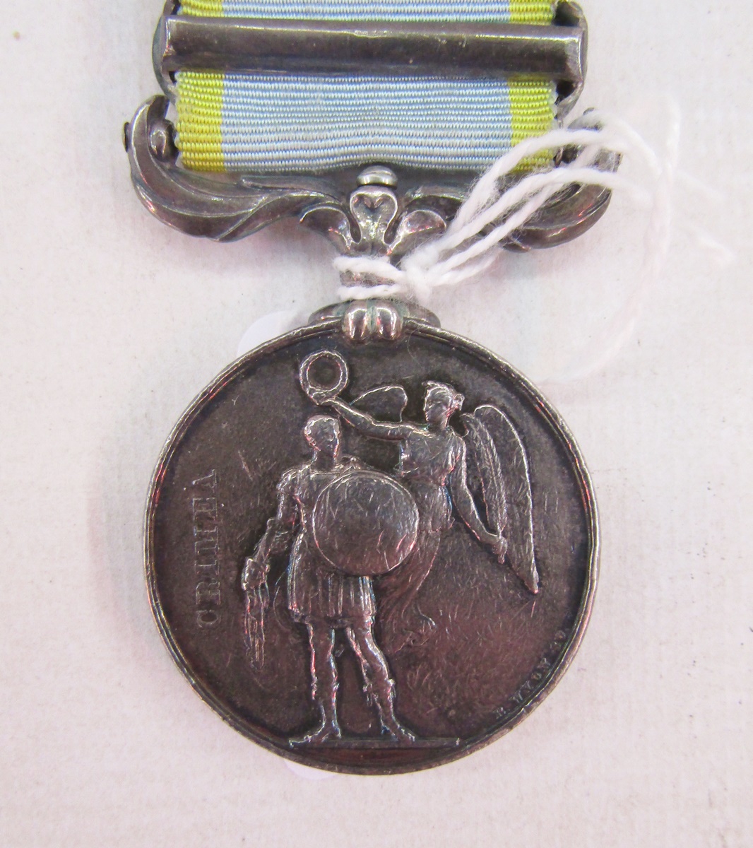 Victorian Crimea medal with Sebastopol clasp, named to 'No 2139 James Cock 17th Regt'.