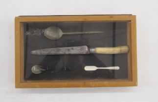 Two cased displays of horn antler and bone cutlery, late 19th/early 20th century, including two