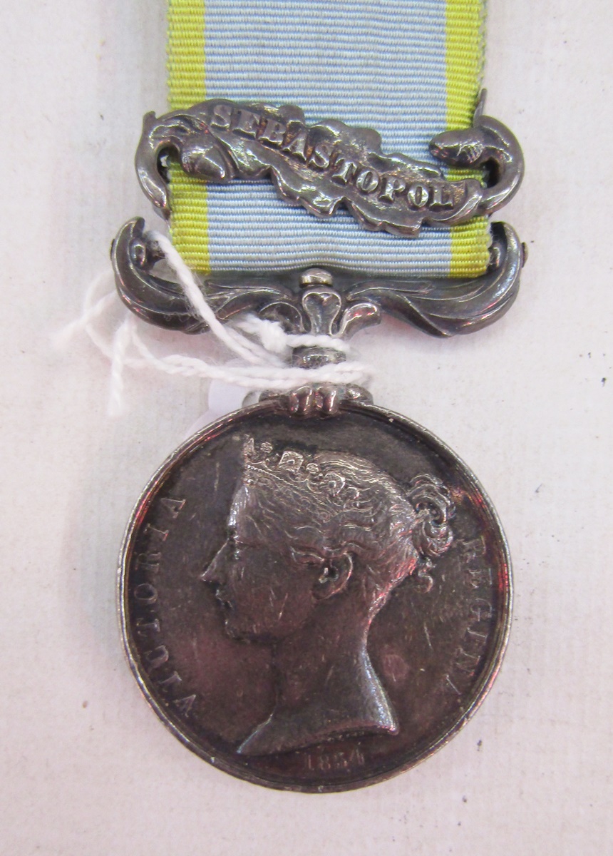 Victorian Crimea medal with Sebastopol clasp, named to 'No 2139 James Cock 17th Regt'. - Image 2 of 12