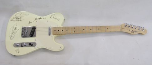Squier Fender cream electric guitar signed by Status Quo, in soft case, signed by Francis Rossi,