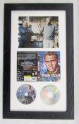 Framed photographic montage of Richard Attenborough and Steve McQueen, including a photograph signed