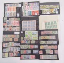 World stamps: Mint & used definitives, commemoratives etc from mid 1800s on stock card/sheet & in